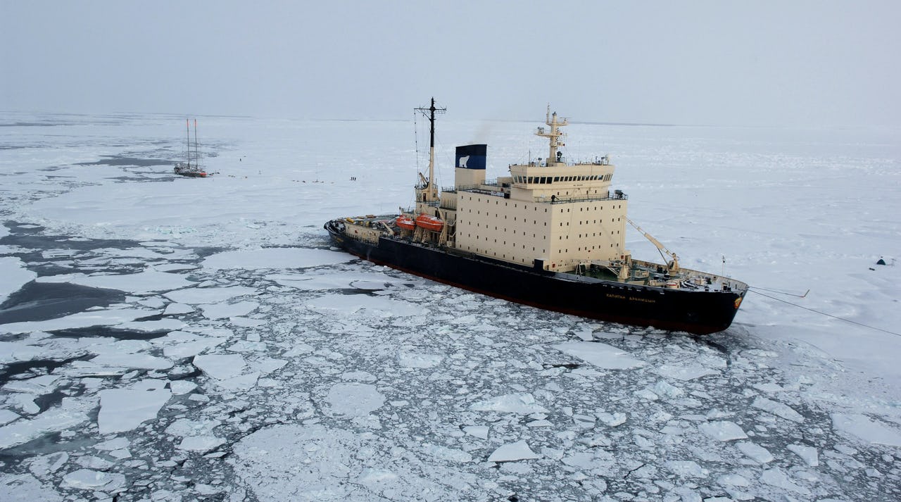 The Arctic Awakening: Geopolitical Tensions Over Melting Ice and New Trade Routes
